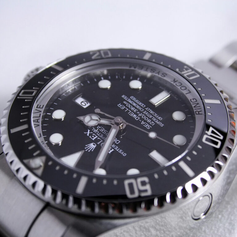 Closeup of silver watch for appraisal. We provide appraisals. We buy watches.